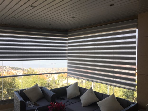 https://www.albaradigallery.com/wp-content/uploads/2023/11/al-baradi-gallery-products-materials-high-end-roller-blinds-sunscreen-blackout-duo-roller-fabric-3.jpg